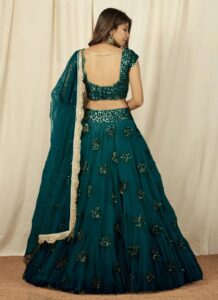 Teal green umbrella lehenga with sequins work wedding wear back view