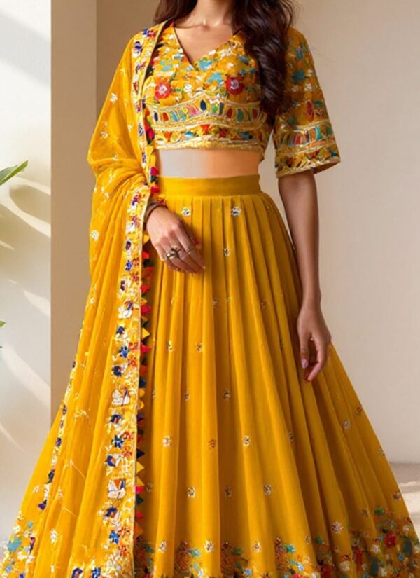 Yellow sequin umbrella-cut lehenga choli with attached dupatta side view